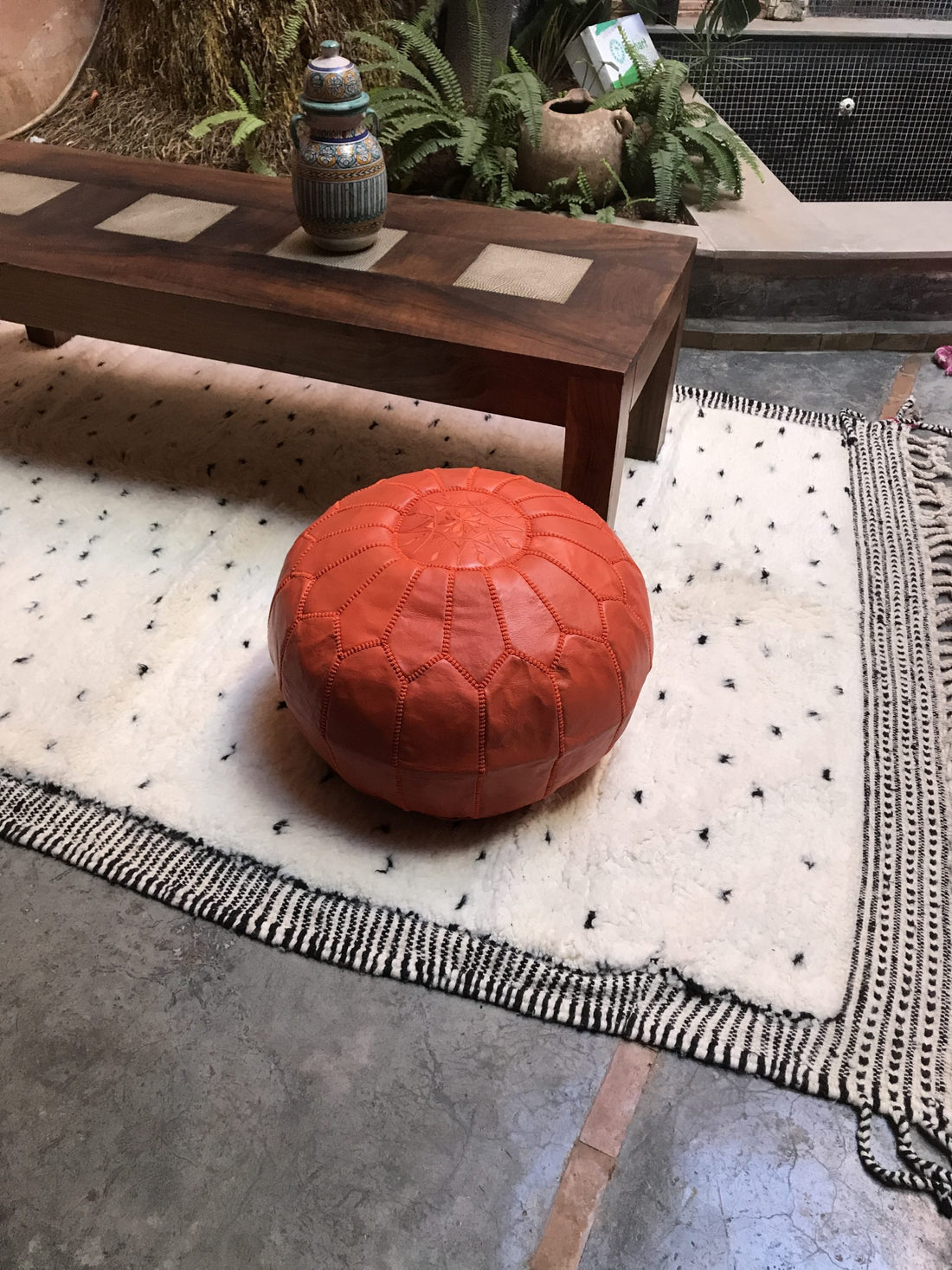 Orange Moroccan leather pouf