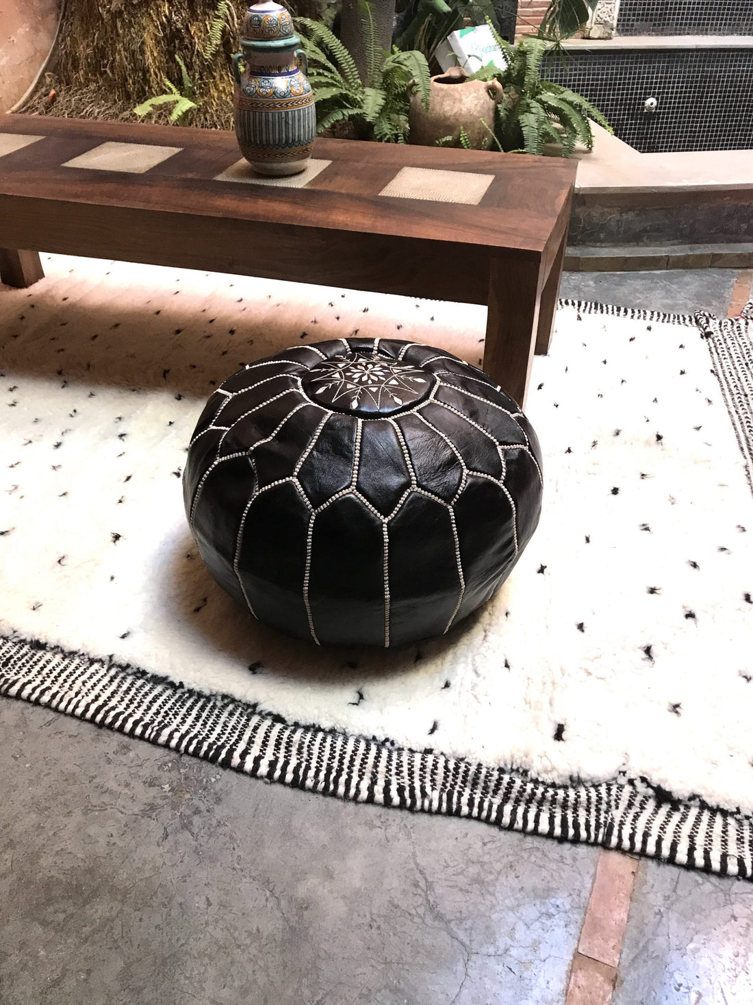 Black Moroccan leather pouf