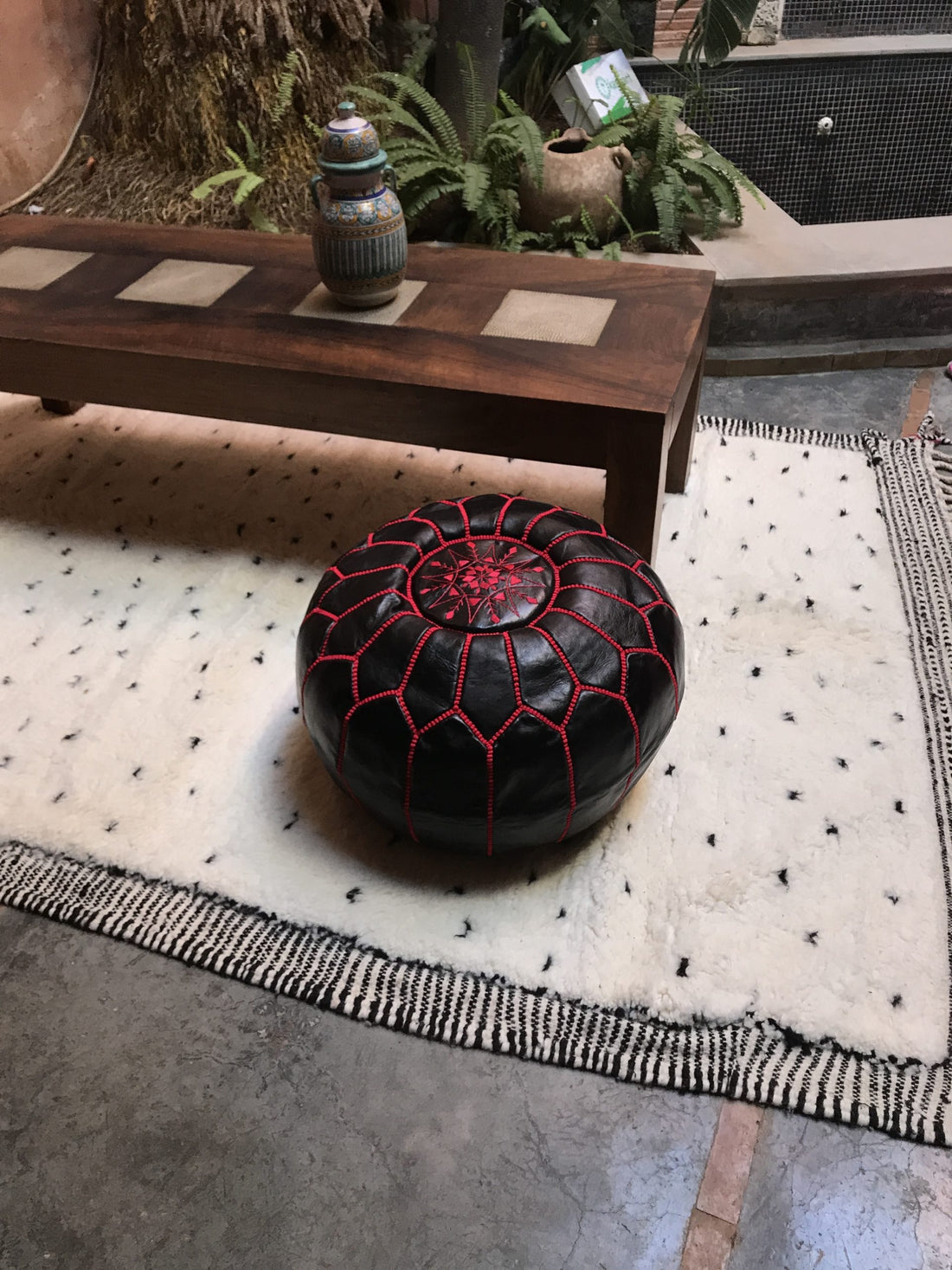 Black Moroccan leather pouf