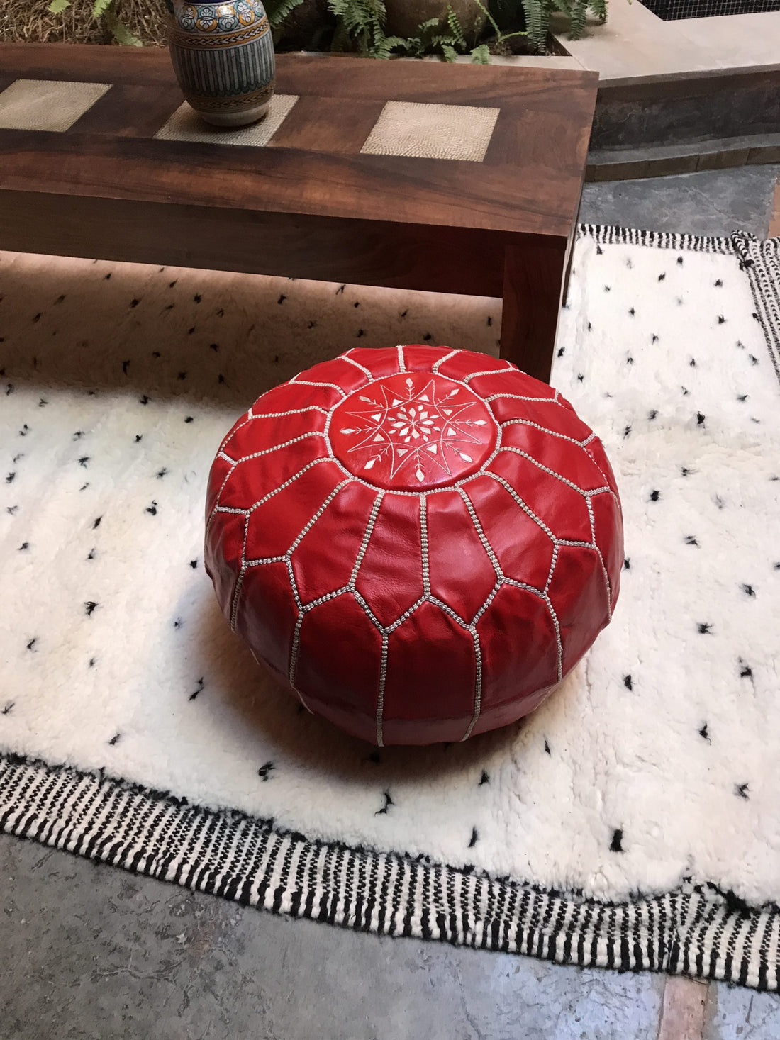 Red Moroccan leather pouf