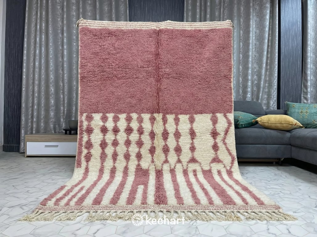 Close-up detail of handwoven Beni Ourain wool pile in slate rose color, highlighting the thick shaggy texture and individual artisan knots.
