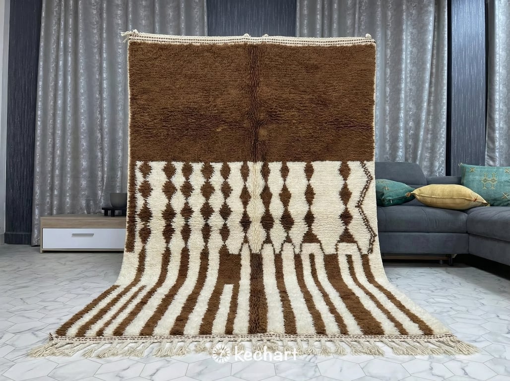 Large custom sized Berber area rug in leather brown wool spanning an expansive open-plan dining and lounge area providing warmth to the space.