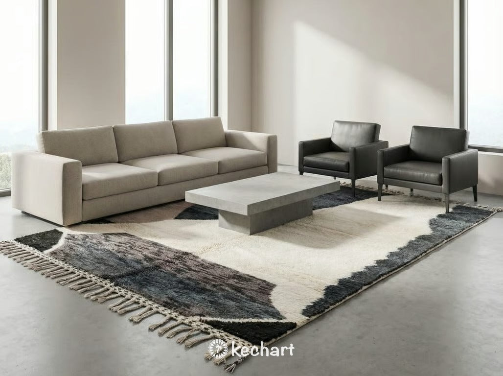 Close-up detail of hand-knotted Beni Ourain wool fibers and traditional fringe on a custom-ordered rug, highlighting the grey and taupe geometric weave.