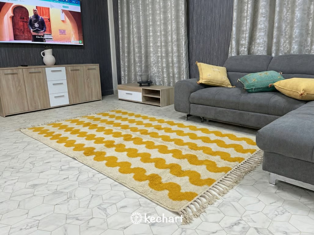 Cozy bohemian bedroom featuring a fluffy, made-to-order Moroccan shag rug at the foot of a bed, adding warmth with its saffron diamond motifs.