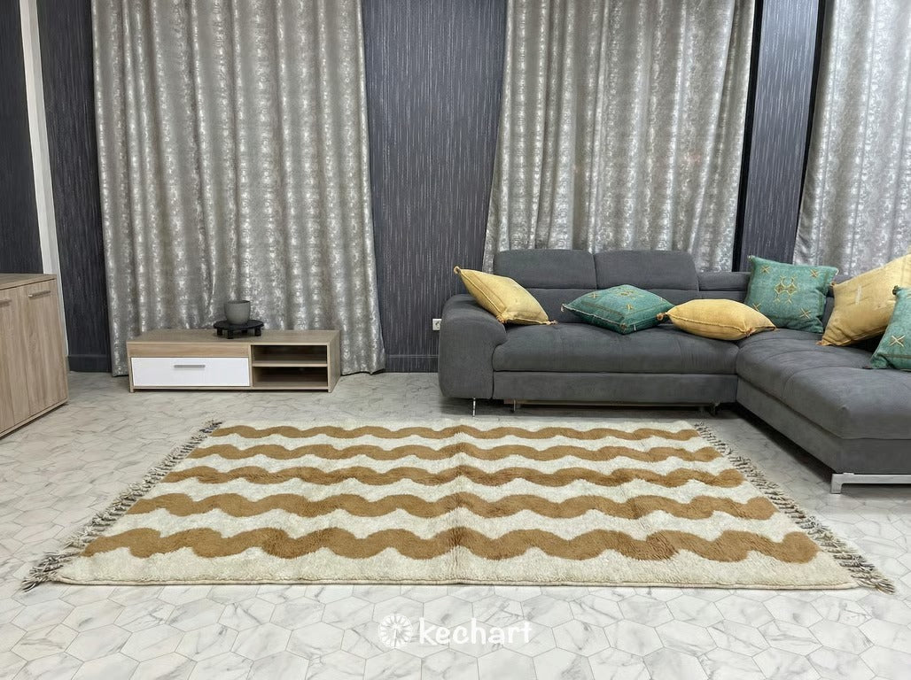 Close-up detail of the plush pile and geometric design of a custom made Beni Ourain wool rug in a cozy reading nook.