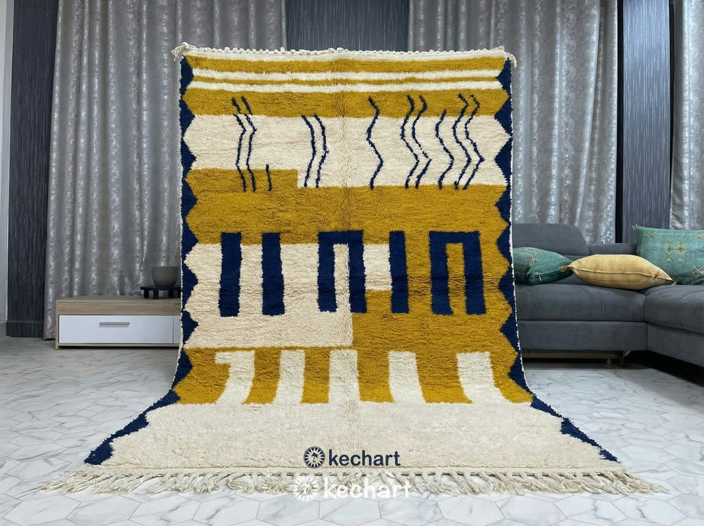 Expansive custom size Berber rug defining an open-plan living space with modern furniture, highlighting the handmade craftsmanship and warm palette.