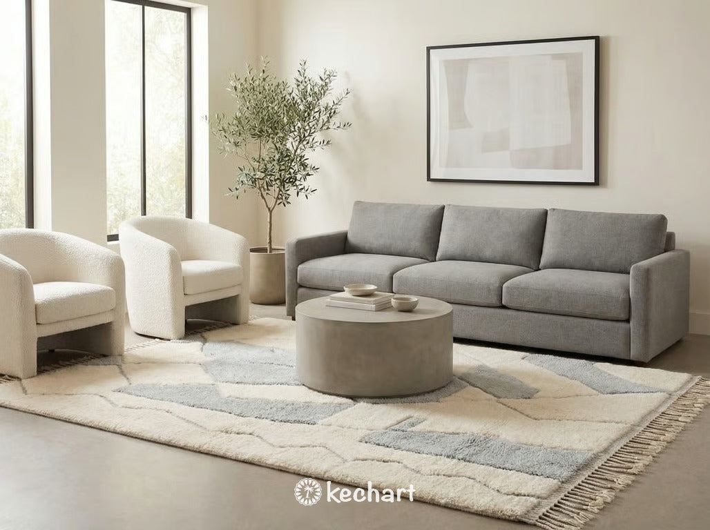 Plush cream and grey Moroccan shag rug placed beside a bed in a serene, Scandi-style master bedroom.