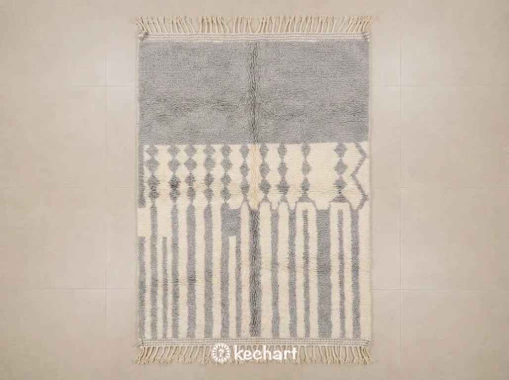 Custom made Beni Ourain Moroccan rug in light silver grey wool with geometric diamond pattern, handwoven plush texture with traditional fringe.