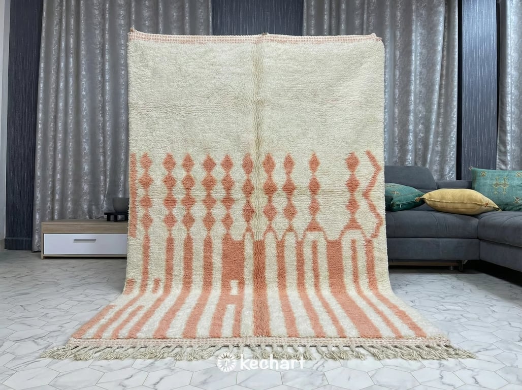 Close-up detail shot demonstrating the thick, high pile sheep's wool texture and uneven, artisanal hand-knotting quality of the custom salmon Beni Ourain rug.
