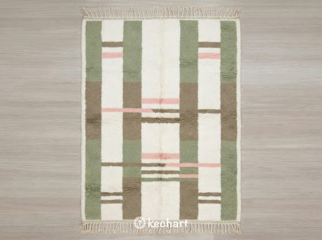 Custom made Beni Ourain Moroccan wool rug featuring plush shaggy pile with geometric diamond patterns in sage green, powder pink, soft white, and earthy taupe colors.