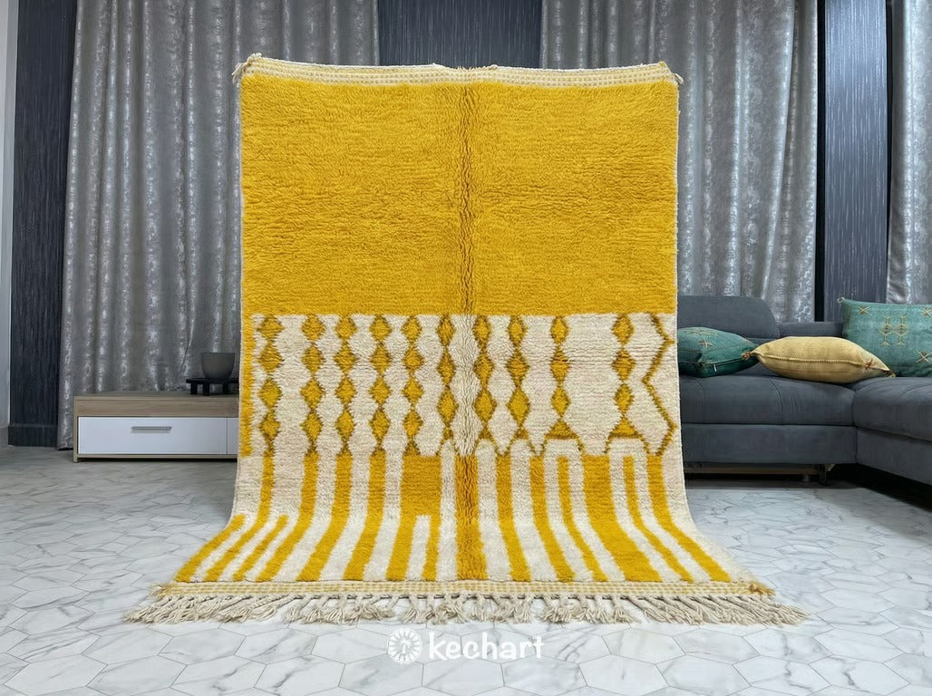 Close-up shot of the thick handknotted wool pile of a custom yellow Moroccan rug showing artisanal quality and medium density diamond design.
