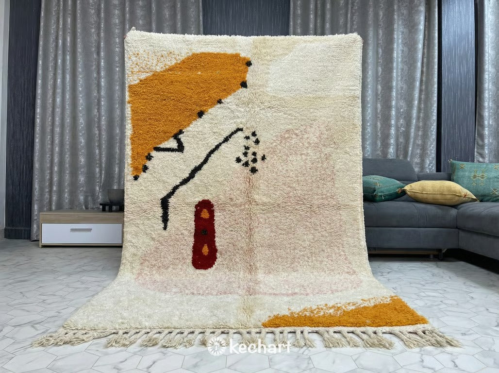 Close-up detail view of hand-knotted Beni Ourain wool pile showing rich dye variation and texture in crimson, orange, and cream threads.