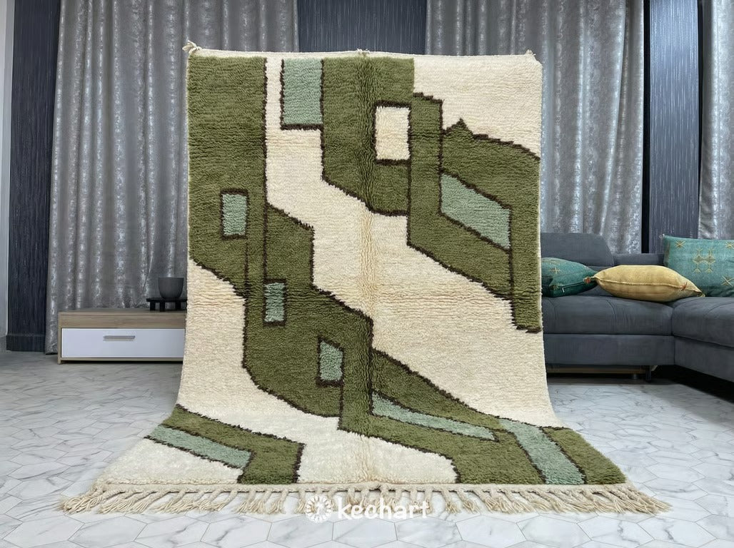 Large custom size geometric Moroccan rug defining a spacious entryway, bridging modern design with traditional artisan craftsmanship in muted green colors.