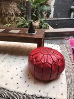 Red Moroccan leather pouf