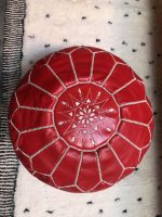 Red Moroccan leather pouf