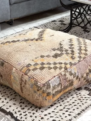 Experience Tranquility and Warmth with the Coastal Breeze Kilim Pouf